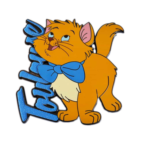 An enamel pin featuring the orange cartoon cat Toulouse from The Aristocats next to blue glittery script text that reads 'Toulouse'